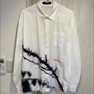 Undercover barbed wire button up